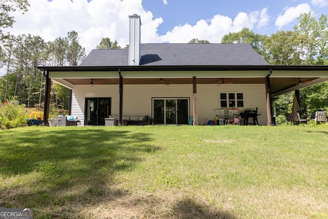 181 S Chattahoochee Dr, Hogansville, GA 30230 - rear view of property featuring ceiling fan, a yard, and a chimney