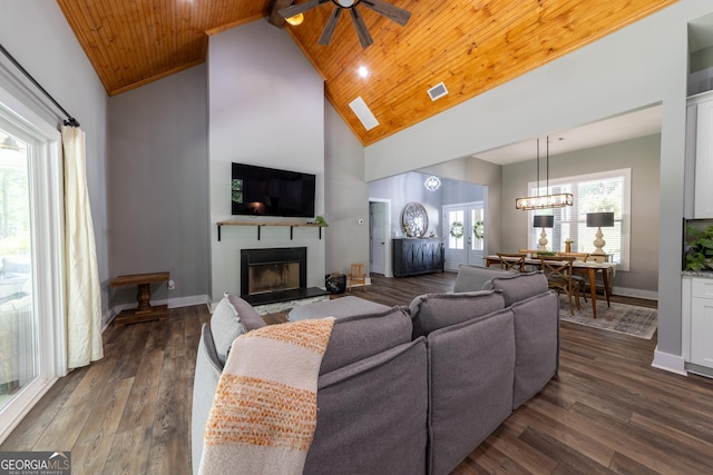 181 S Chattahoochee Dr, Hogansville, GA 30230 - living room with a fireplace with raised hearth, ceiling fan, high vaulted ceiling, dark wood-style flooring, and wood ceiling