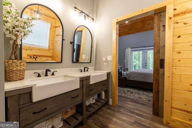 181 S Chattahoochee Dr, Hogansville, GA 30230 - ensuite bathroom featuring wood finished floors, double vanity, and french doors