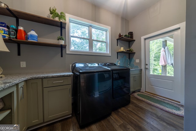 181 S Chattahoochee Dr, Hogansville, GA 30230 - laundry area with cabinet space, washer and clothes dryer, and dark wood-type flooring