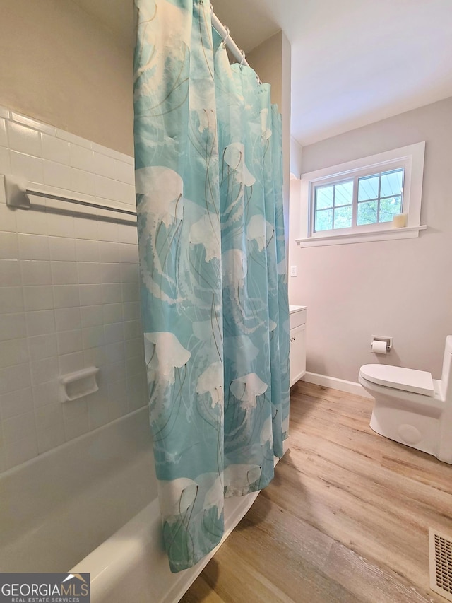 723 Fricks Ln, Rossville, GA 30741 - full bath with wood finished floors, shower / tub combo, and vanity