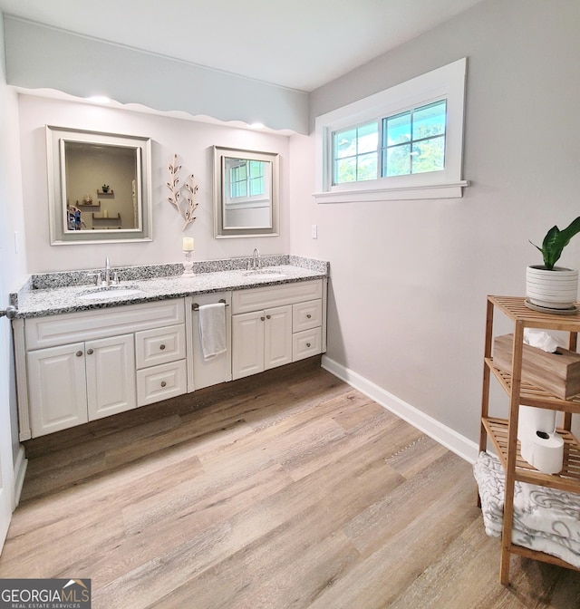 723 Fricks Ln, Rossville, GA 30741 - bathroom with double vanity and wood finished floors