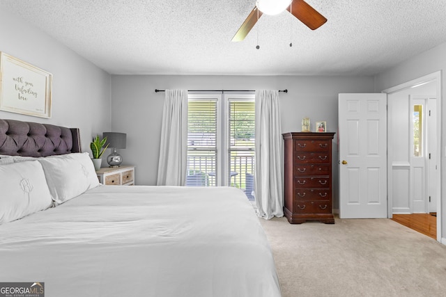 100 Merrill Dr, Lagrange, GA 30241 - carpeted bedroom featuring a textured ceiling and ceiling fan