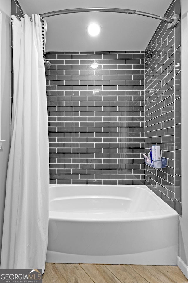 100 Merrill Dr, Lagrange, GA 30241 - full bath with wood finished floors and shower / bathtub combination with curtain