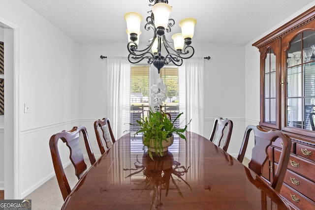 100 Merrill Dr, Lagrange, GA 30241 - dining area featuring a chandelier and a textured ceiling