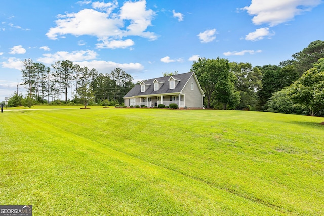 100 Merrill Dr, Lagrange, GA 30241 - cape cod home featuring a front lawn and view of scattered trees