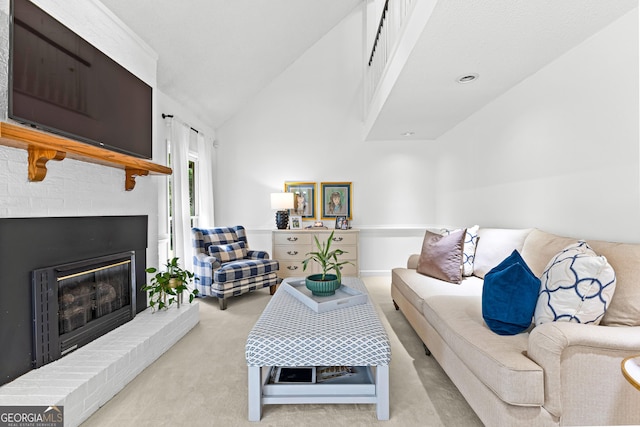 100 Merrill Dr, Lagrange, GA 30241 - living room featuring carpet flooring, a brick fireplace, and vaulted ceiling