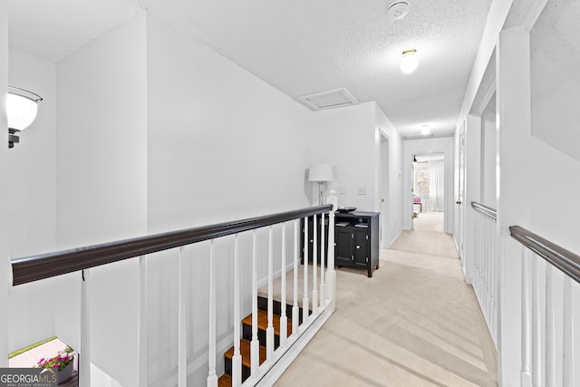 100 Merrill Dr, Lagrange, GA 30241 - hall with light carpet, attic access, and a textured ceiling