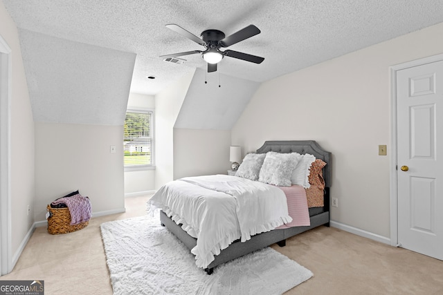 100 Merrill Dr, Lagrange, GA 30241 - bedroom with carpet, lofted ceiling, a textured ceiling, and ceiling fan