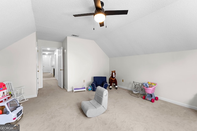 100 Merrill Dr, Lagrange, GA 30241 - playroom featuring lofted ceiling, carpet, ceiling fan, and a textured ceiling