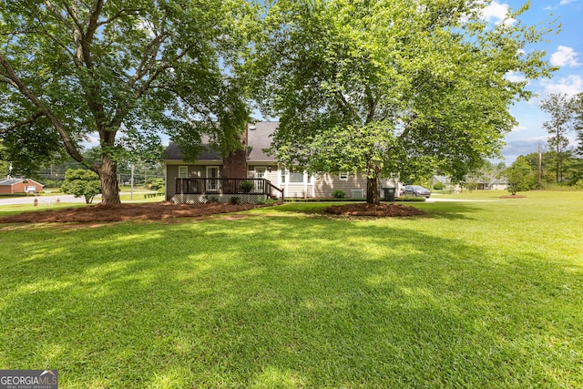 100 Merrill Dr, Lagrange, GA 30241 - view of grassy yard featuring a wooden deck