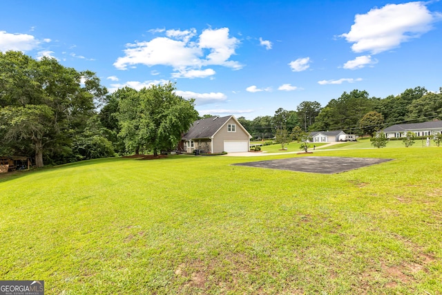 100 Merrill Dr, Lagrange, GA 30241 - view of green lawn featuring driveway and view of scattered trees