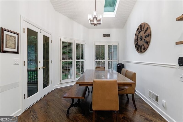 525 Avala Ct, Johns Creek, GA 30022 - dining room featuring french doors, wood finished floors, a chandelier, and a skylight