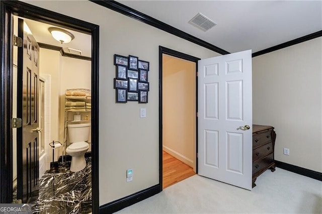 525 Avala Ct, Johns Creek, GA 30022 - carpeted bedroom with ornamental molding and ensuite bath