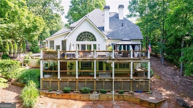 525 Avala Ct, Johns Creek, GA 30022 - back of property with a gazebo, a chimney, a shingled roof, a wooden deck, and stucco siding