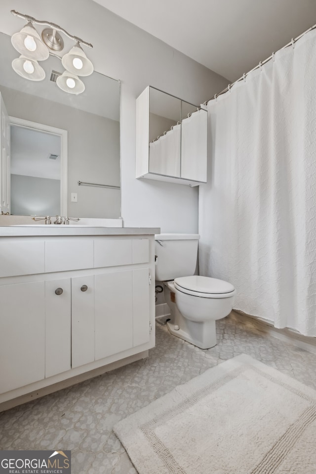 3220 Casteel Rd, Marietta, GA 30062 - bathroom with vanity and tile patterned floors