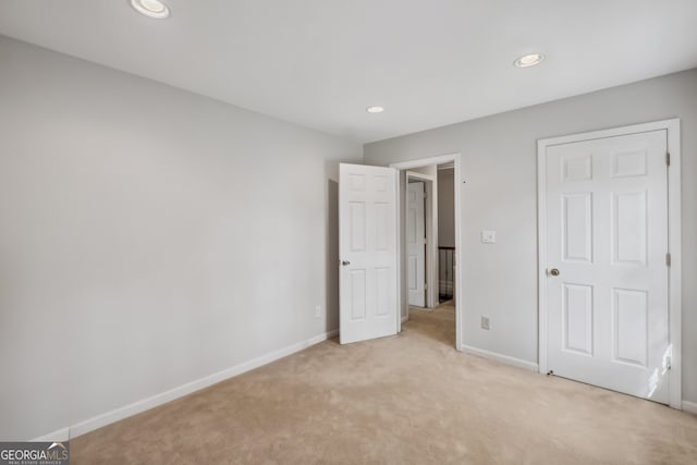 3220 Casteel Rd, Marietta, GA 30062 - unfurnished bedroom with light carpet and recessed lighting