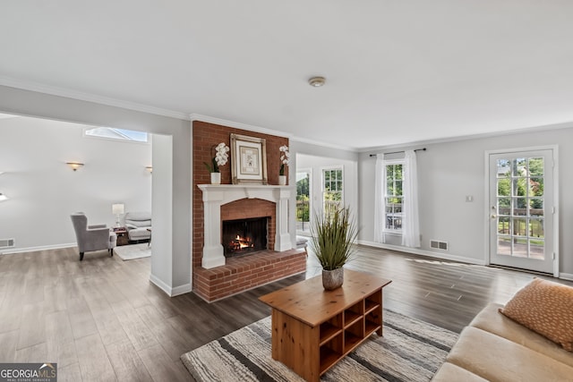 3220 Casteel Rd, Marietta, GA 30062 - living room with crown molding, a fireplace, and wood finished floors