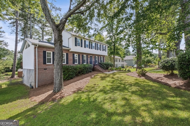 3220 Casteel Rd, Marietta, GA 30062 - view of front of property with brick siding and a front yard