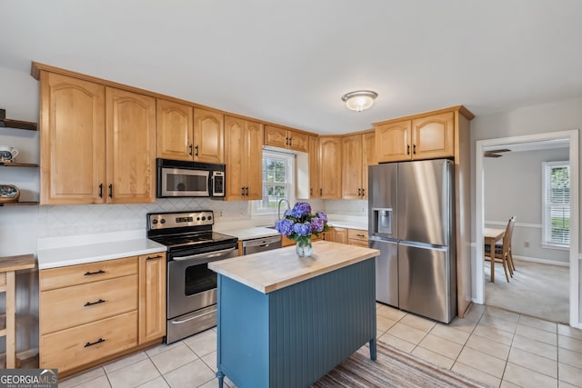3220 Casteel Rd, Marietta, GA 30062 - kitchen with stainless steel appliances, open shelves, light tile patterned floors, and backsplash
