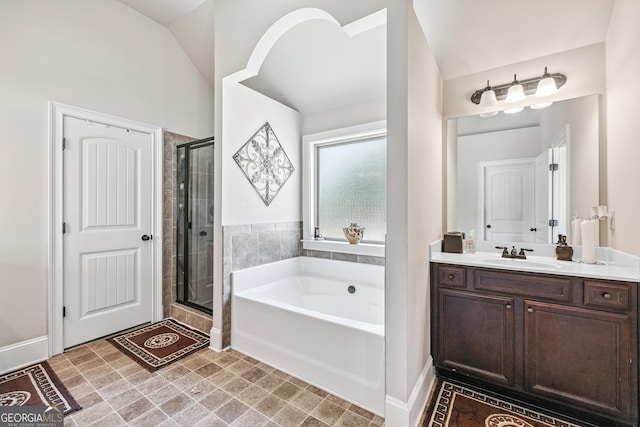 3024 Bridgehaven Ct, Snellville, GA 30039 - full bathroom with a garden tub, vanity, a shower stall, and lofted ceiling