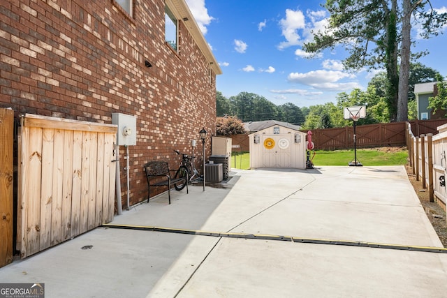 3024 Bridgehaven Ct, Snellville, GA 30039 - fenced backyard with a storage unit and a patio