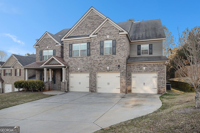 7691 Brazos Trl, Fairburn, GA 30213 - craftsman-style home with a garage, concrete driveway, and brick siding
