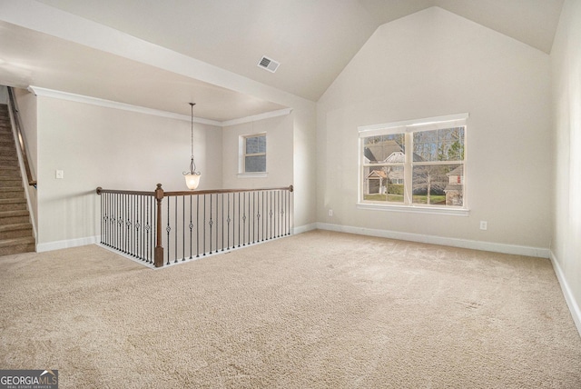 7691 Brazos Trl, Fairburn, GA 30213 - spare room featuring carpet floors and high vaulted ceiling