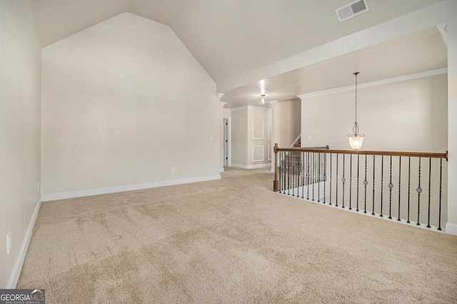 7691 Brazos Trl, Fairburn, GA 30213 - empty room featuring carpet floors and vaulted ceiling