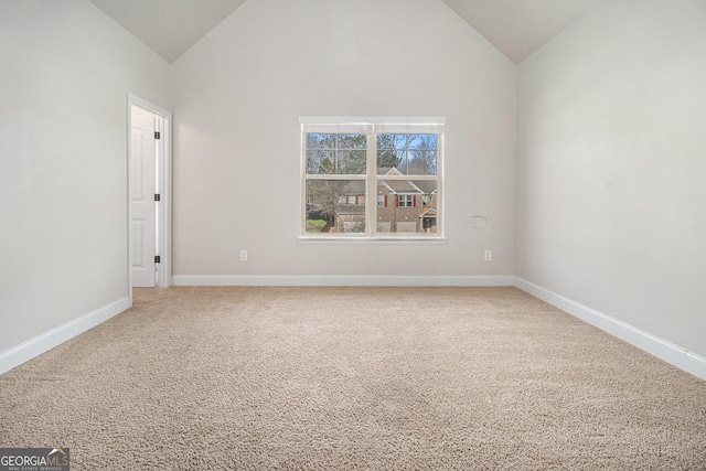 7691 Brazos Trl, Fairburn, GA 30213 - unfurnished room with light colored carpet and high vaulted ceiling