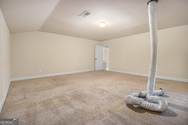 7691 Brazos Trl, Fairburn, GA 30213 - empty room with carpet floors and vaulted ceiling