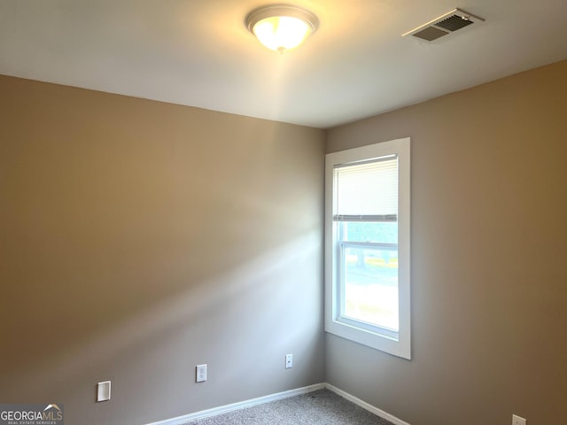 6300 Creekford Ln, Lithonia, GA 30058 - carpeted spare room featuring baseboards