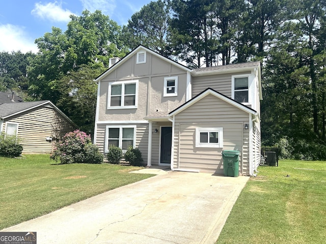 6300 Creekford Ln, Lithonia, GA 30058 - view of front facade with a front yard, concrete driveway, and a chimney