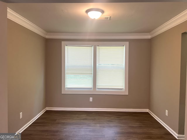6300 Creekford Ln, Lithonia, GA 30058 - spare room featuring ornamental molding and dark wood-style floors