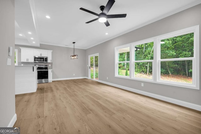 155 Carey St, Franklin Springs, GA 30662 - unfurnished living room featuring light wood-type flooring, a ceiling fan, recessed lighting, and ornamental molding