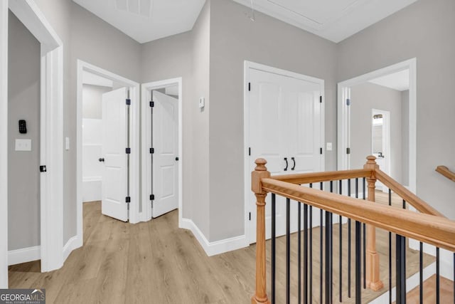 155 Carey St, Franklin Springs, GA 30662 - corridor featuring an upstairs landing, attic access, and light wood-style flooring