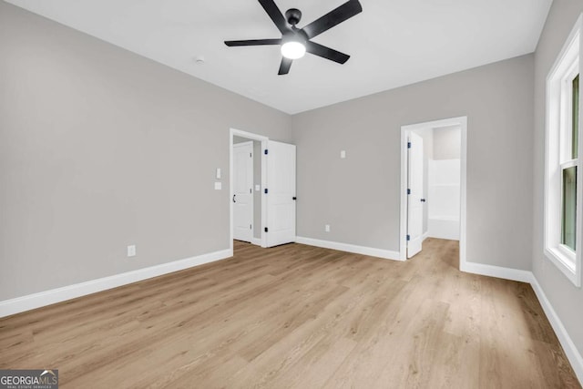 155 Carey St, Franklin Springs, GA 30662 - unfurnished bedroom with light wood finished floors and ceiling fan