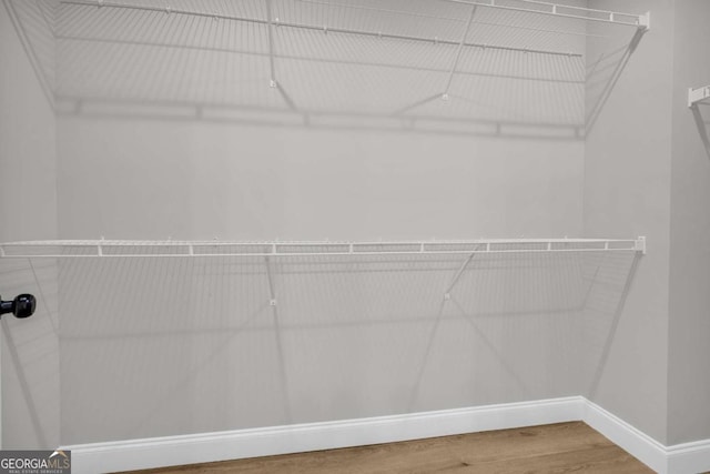 155 Carey St, Franklin Springs, GA 30662 - walk in closet featuring wood finished floors