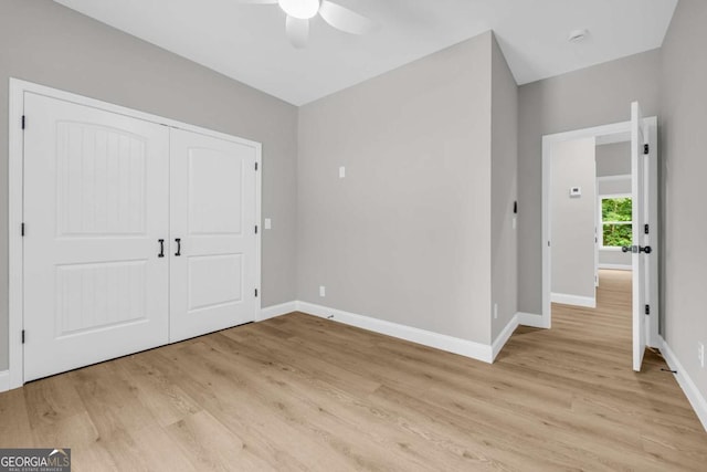 155 Carey St, Franklin Springs, GA 30662 - unfurnished bedroom featuring light wood-type flooring, a closet, and a ceiling fan