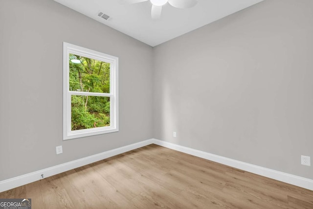 155 Carey St, Franklin Springs, GA 30662 - empty room with wood finished floors and a ceiling fan