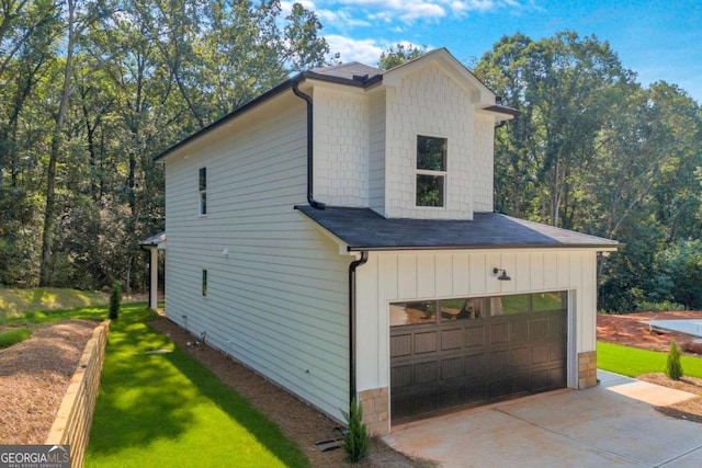 155 Carey St, Franklin Springs, GA 30662 - view of property exterior featuring a garage and a shingled roof