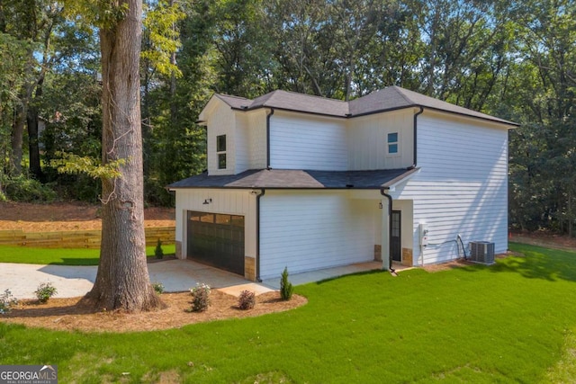 155 Carey St, Franklin Springs, GA 30662 - view of home's exterior with a yard, a garage, driveway, and view of wooded area