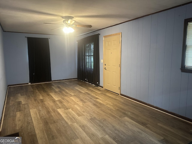 26 Fleming St, Royston, GA 30662 - unfurnished room featuring a ceiling fan and wood finished floors