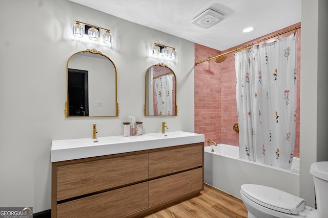 1120 Glass Bridge Rd, Lagrange, GA 30240 - full bathroom featuring double vanity, shower / bathtub combination with curtain, and wood finished floors