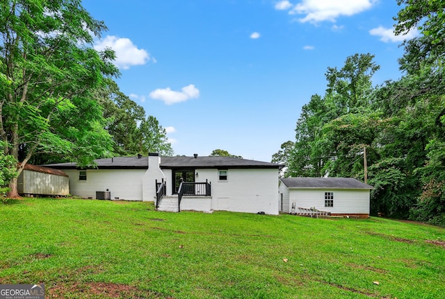 1120 Glass Bridge Rd, Lagrange, GA 30240 - rear view of property with a lawn, a chimney, and an outbuilding