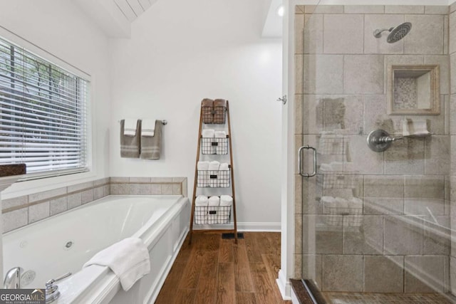 8485 Anchor On Lanier Ct, Gainesville, GA 30506 - bathroom featuring a shower stall, a whirlpool tub, and wood finished floors
