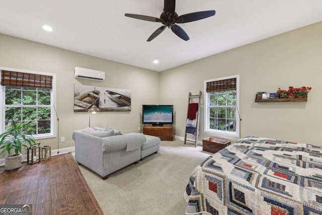 8485 Anchor On Lanier Ct, Gainesville, GA 30506 - bedroom with a wall mounted air conditioner, recessed lighting, ceiling fan, and wood finished floors