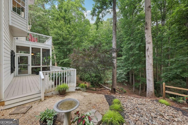8485 Anchor On Lanier Ct, Gainesville, GA 30506 - view of yard with a wooden deck, a balcony, and a sunroom