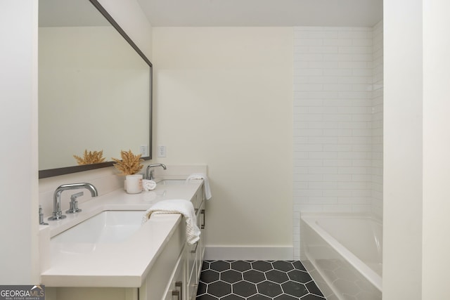 38 Mildred Pl NW, Atlanta, GA 30318 - full bathroom featuring tile patterned floors and double vanity