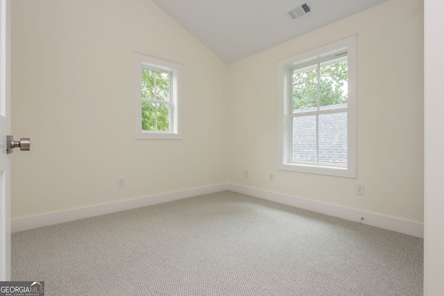 38 Mildred Pl NW, Atlanta, GA 30318 - carpeted empty room featuring vaulted ceiling and baseboards